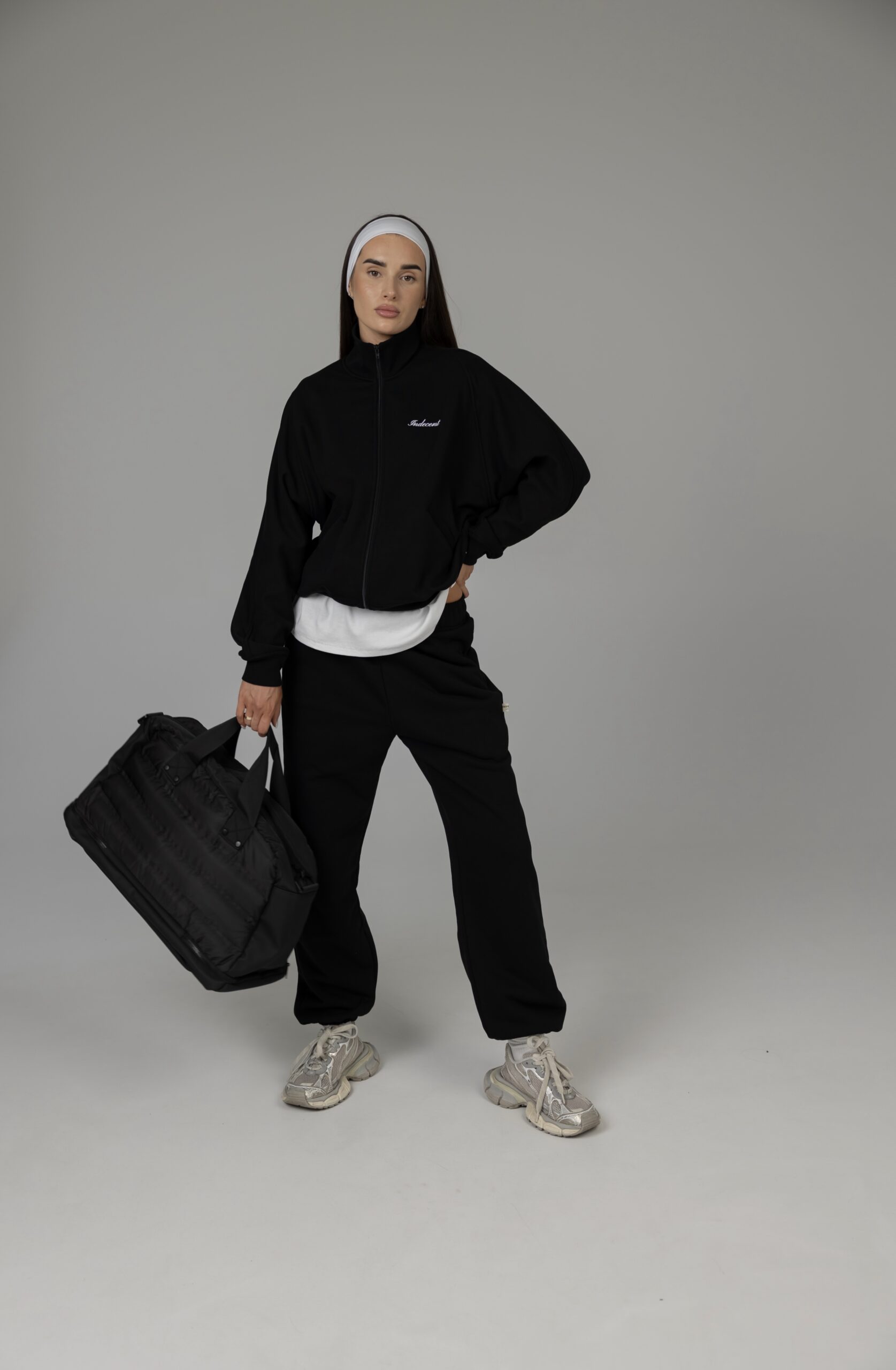 HIGH COLLAR ZIP IN BLACK